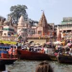 Why does the Ganga flow in the reverse direction in Kashi?