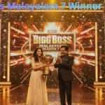 Bigg Boss Malayalam 7 Winner: Anumol Creates History, Lifts the Trophy With Rs 50 Lakh Prize Anumol holding the Bigg Boss Malayalam Season 7 winner’s trophy during the grand finale celebration.