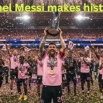 Lionel Messi celebrates with the MLS Cup trophy after leading Inter Miami to their first championship victory